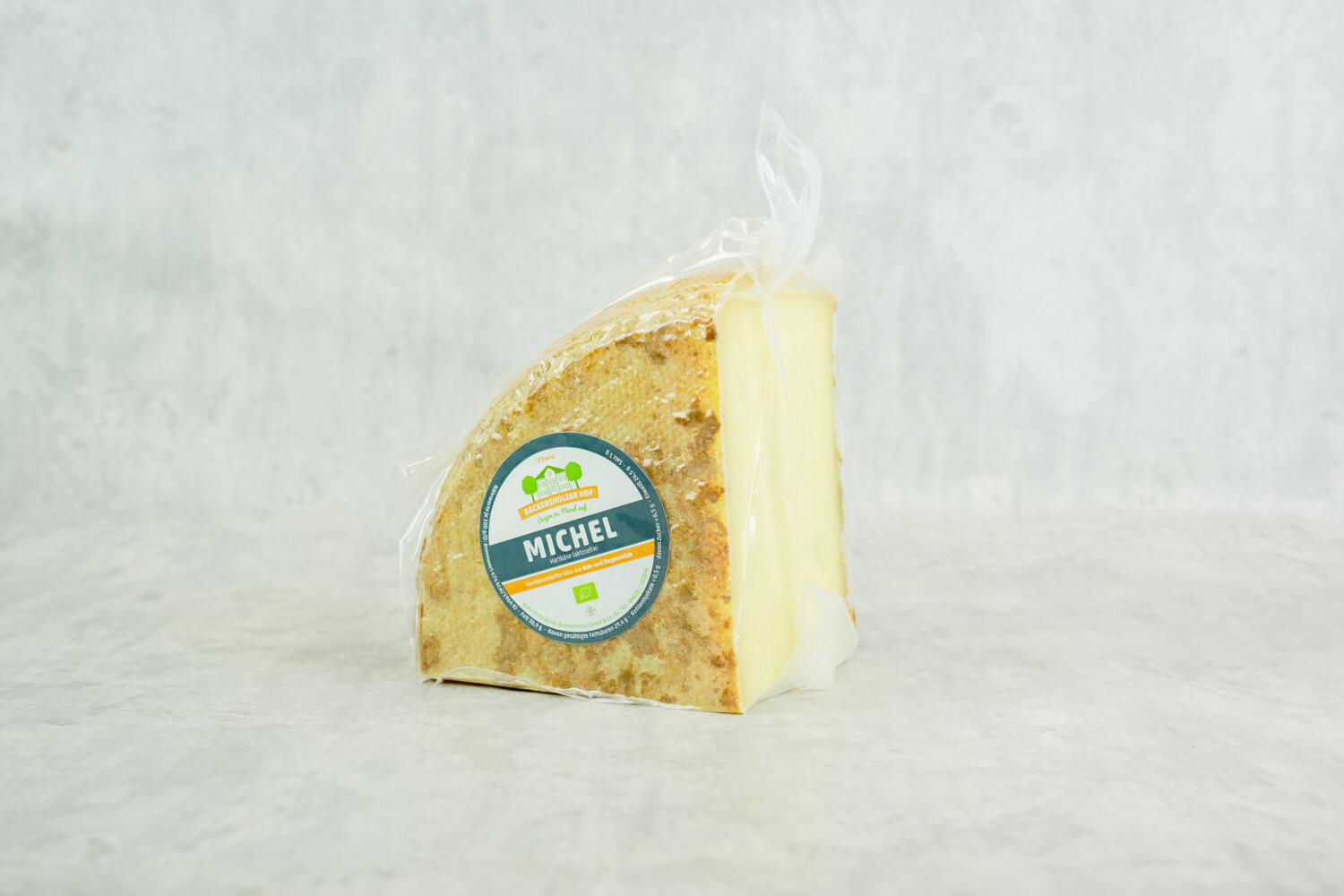 40002636-532871-kaese-bs-michel-geviertelt-backensholz-bio-ca-1-12-kg-stk.jpg